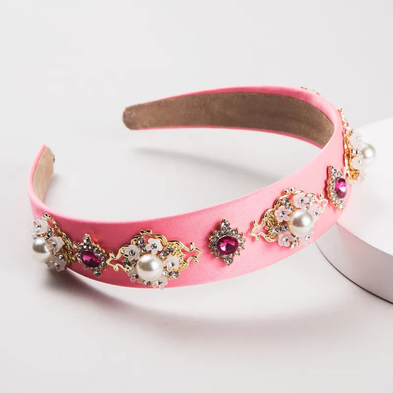 Handle bags with minimalist sleek silhouettes -Zena Pink Hairband