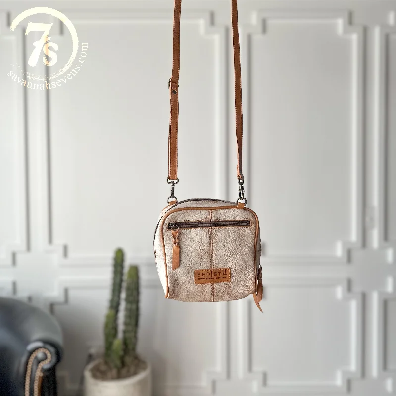 Handle bags with elegant gold-tone hardware -The Neola