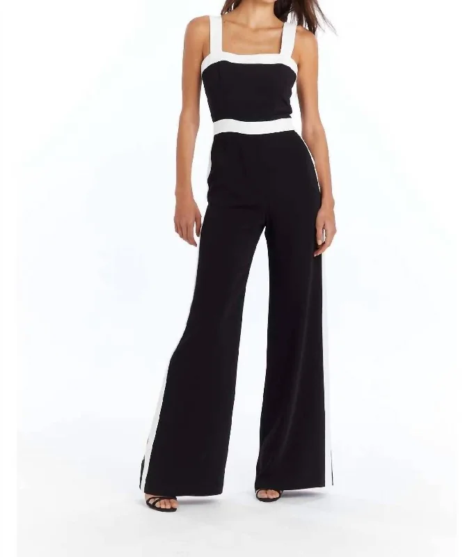 Versatile tight trousers for women with fold-over waist for adjustable comfort -Jessel Jumpsuitt In Black