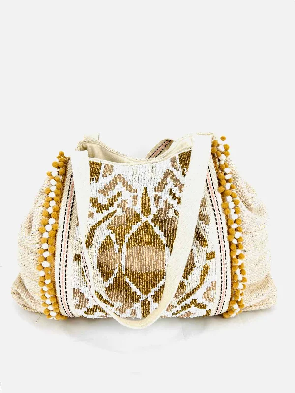 Reversible handle bags offering dual design styles -America & Beyond Cream/Gold Shimmer Beaded Purses Tote