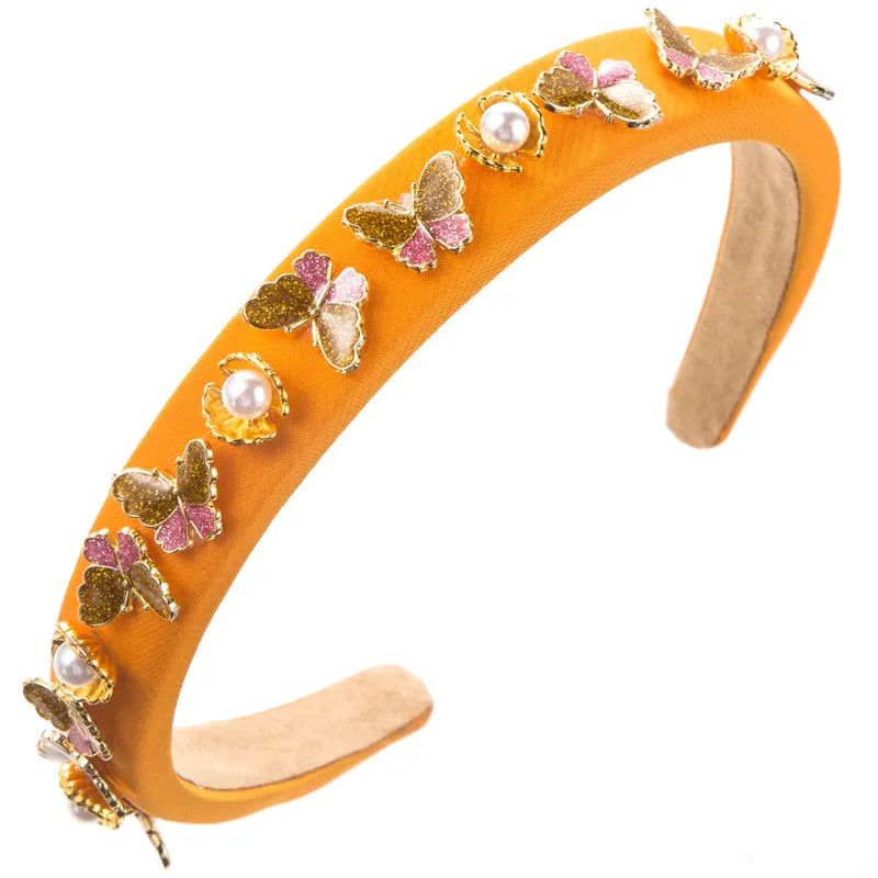 Handle bags with vibrant colors for boldness -Augusta Orange Hairband