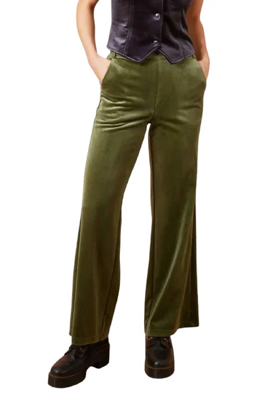 Black leather tight trousers for women with sleek, glossy finish for night out -Clan Trouser In Green