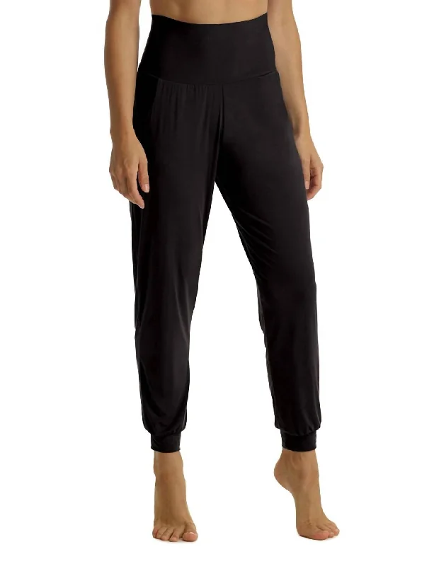 Relaxed fit tight trousers for men with stretch material for comfort and ease -High Rise Butter Jogger Pant In Black