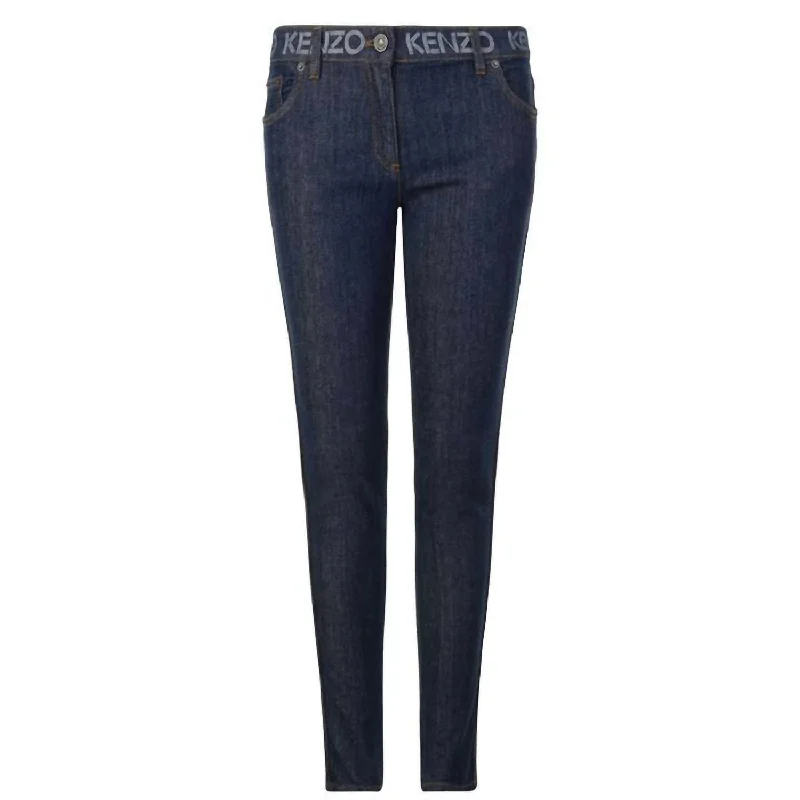 High-waisted tight trousers for women with tapered leg and vintage-inspired design -Women's Paris Logo Waist Stretch Denim Skinny Jeans In Blue