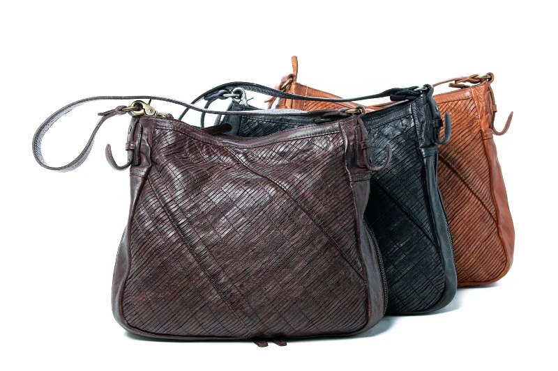 Handle bags with soft linings for protection -Rugged Hide Delia